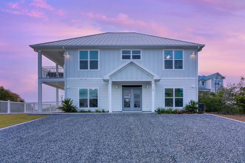 Ocean Bliss from the front at dusk, under a pink sky