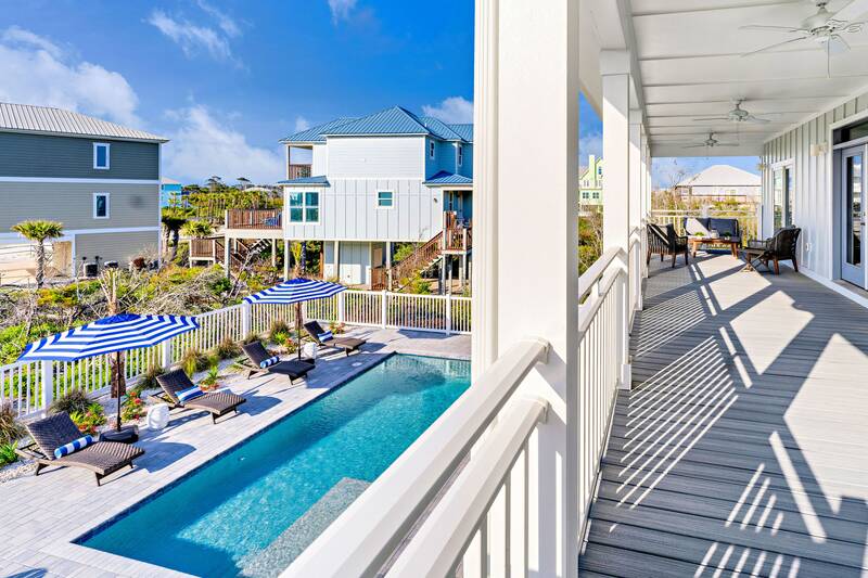 Wraparound porch looking down on the pool